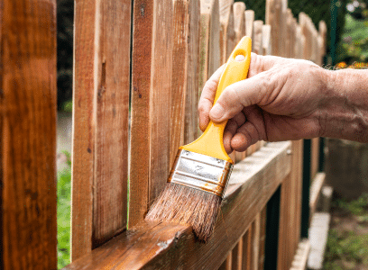 staining a wood fence